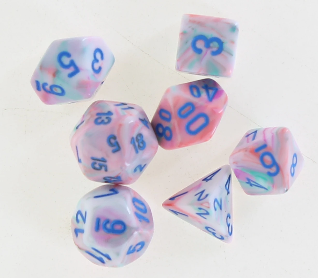 Chessex: Mini Dice Festive Pop Art With Blue 3 Chessex: Mini Dice Festive Pop Art With Blue